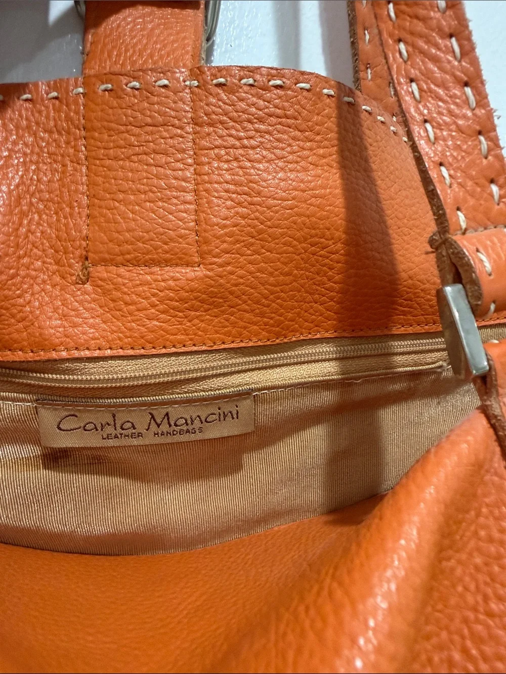 Carla Mancini stylish orange